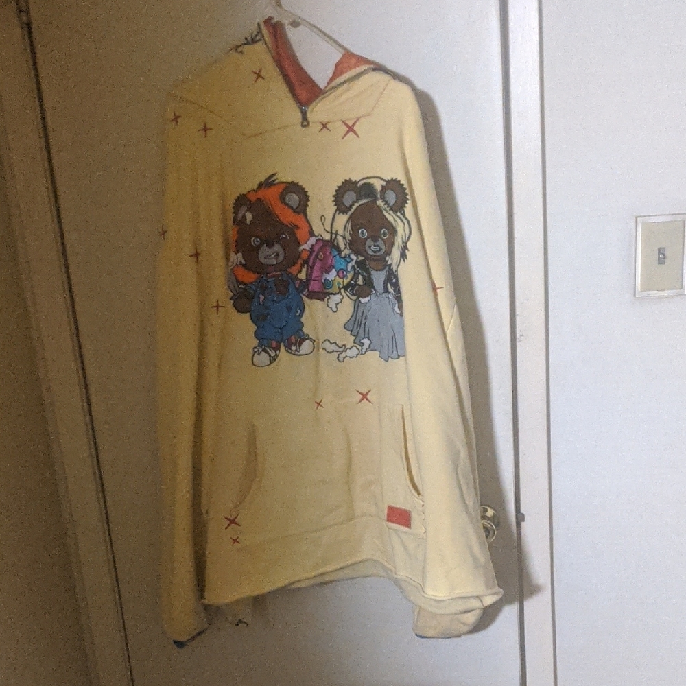 Cream Clored Hoodie with Chucky and Chucky's bride